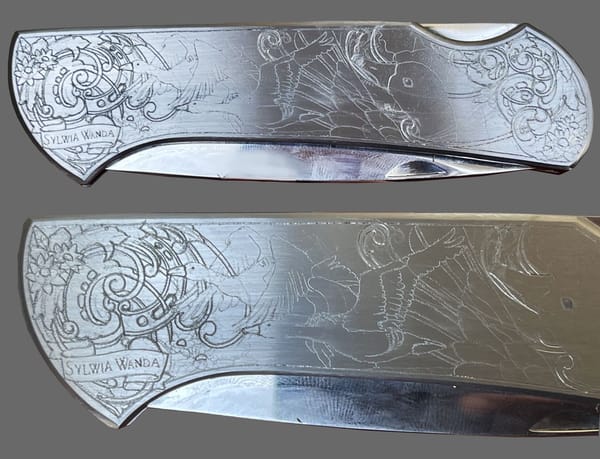 Folding knife with the outlines of the scrollwork and birds cut