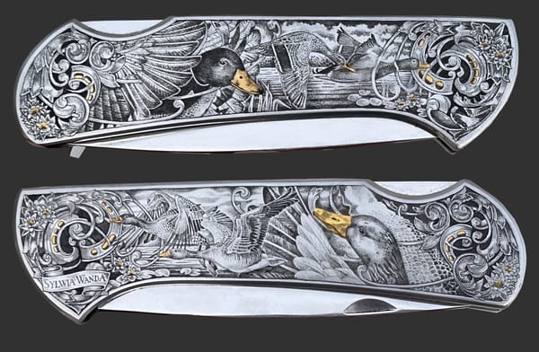 Klappmesser mit gravierten Enten, Akanthusornament und Goldeinlagen