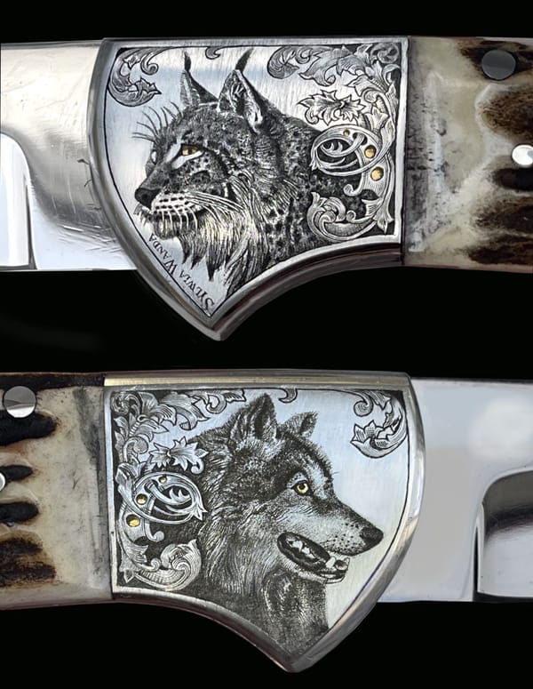 Backen eines Klappmessers mit graviertem Luchs und Wolf