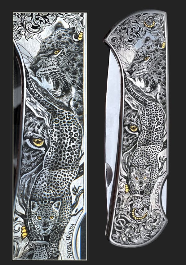 Griffschalen eines Klappmessers mit graviertem Leoparden und goldenen Augen